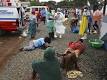 ebola victims lying on the road waiting for medics